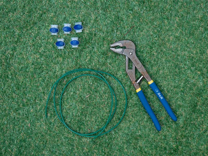 Begrenzingskabel, connectors en tang voor robotgrasmaaiers in tuin